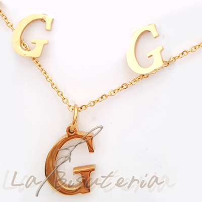 Collar y pendientes 254014, oro. Letra G