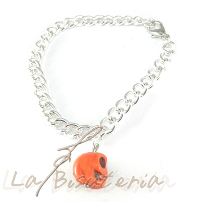 detalle pulsera calaveras naranja