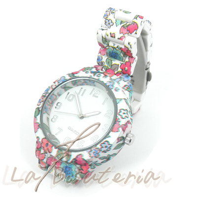 Reloj fantasa. Reloj flores jardin